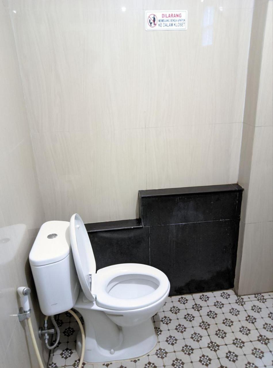 Teratai Residence Mitra Reddoorz ميدان المظهر الخارجي الصورة