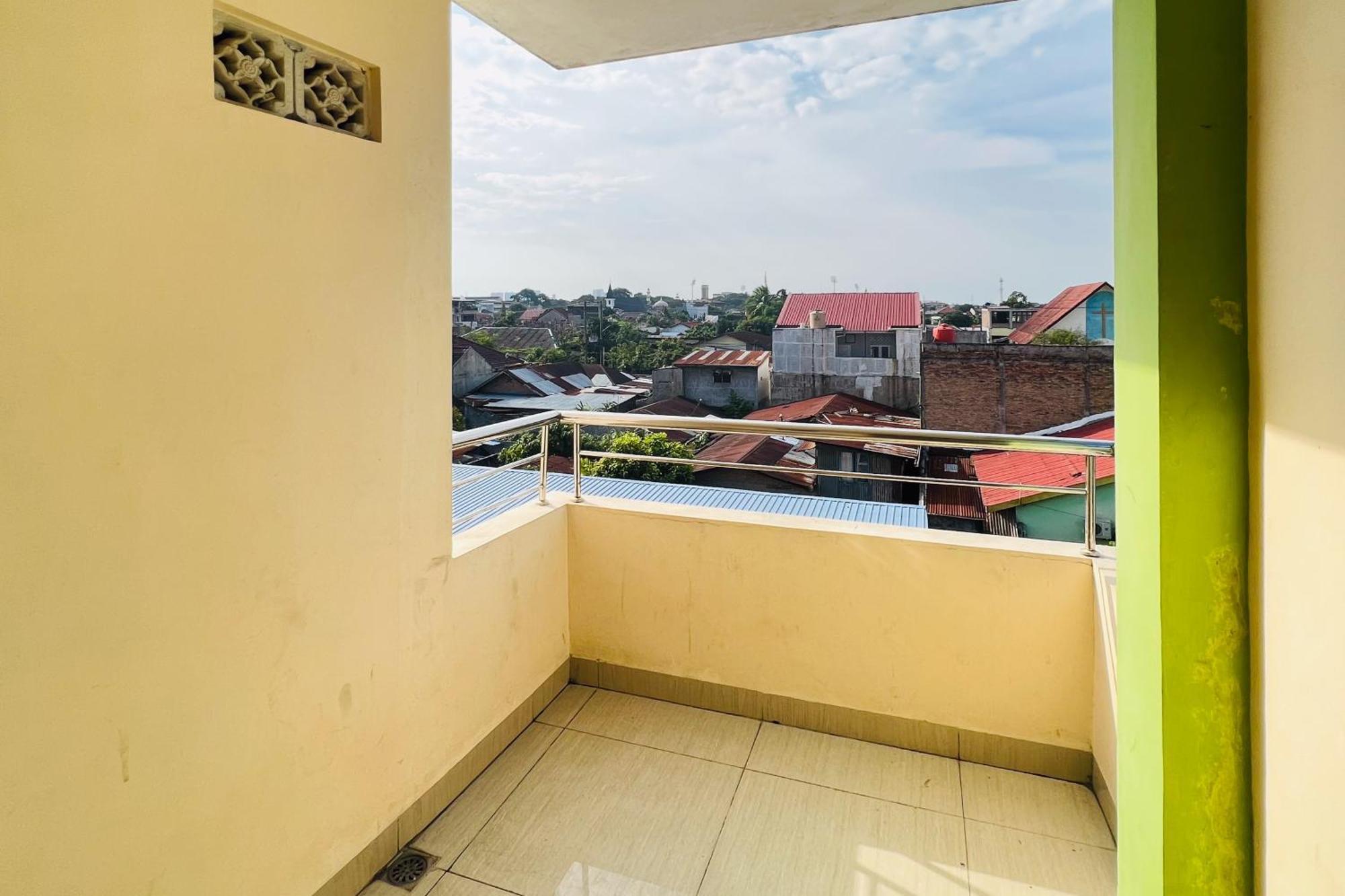 Teratai Residence Mitra Reddoorz ميدان المظهر الخارجي الصورة